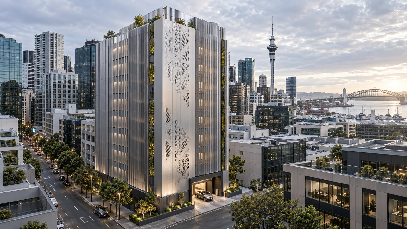 Illustrative concept of an aluminium-clad automated parking building in Auckland CBD, with the Sky Tower and Harbour Bridge behind it and a car entering at street level.